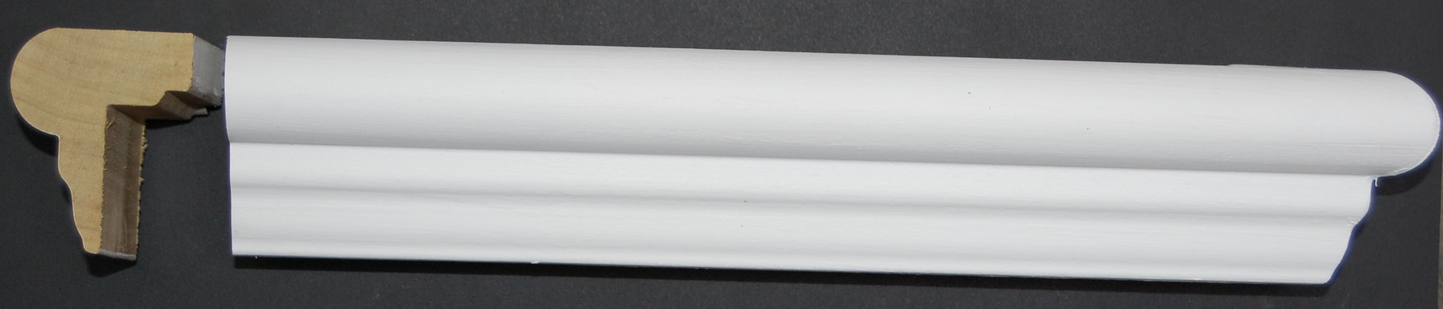 1-5/16" x 1-3/4" Finger Joint Poplar Primed Wainscot Top Cap