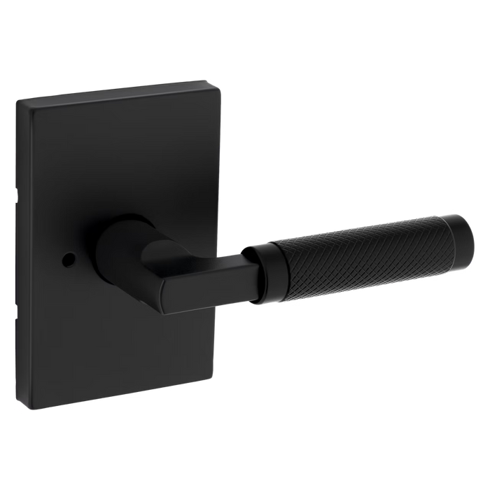 Black door handle on a white background